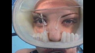 Scuba girl gets cumshot in mask