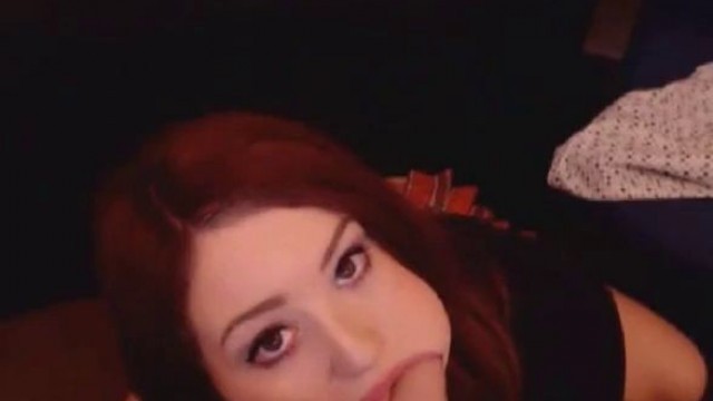 Redhead with big tits rides her dildo and moans on cam