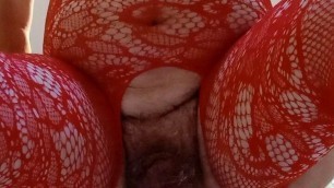 Open crotch red fishnets, dildo and mirror